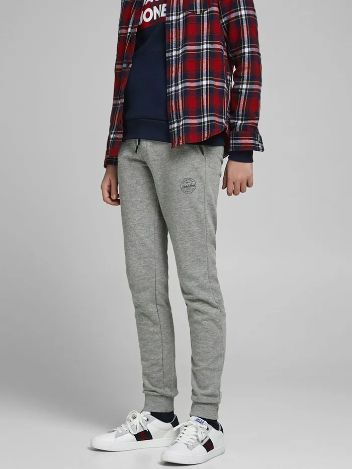 Trousers JACK and JONES Junior BOYS CUFFED SWEATPANTS Grey Light Grey Melange Casaul Trousers JACK and JONES Junior BOYS CUFFED SWEATPANTS Grey Light Grey Melange Casaul