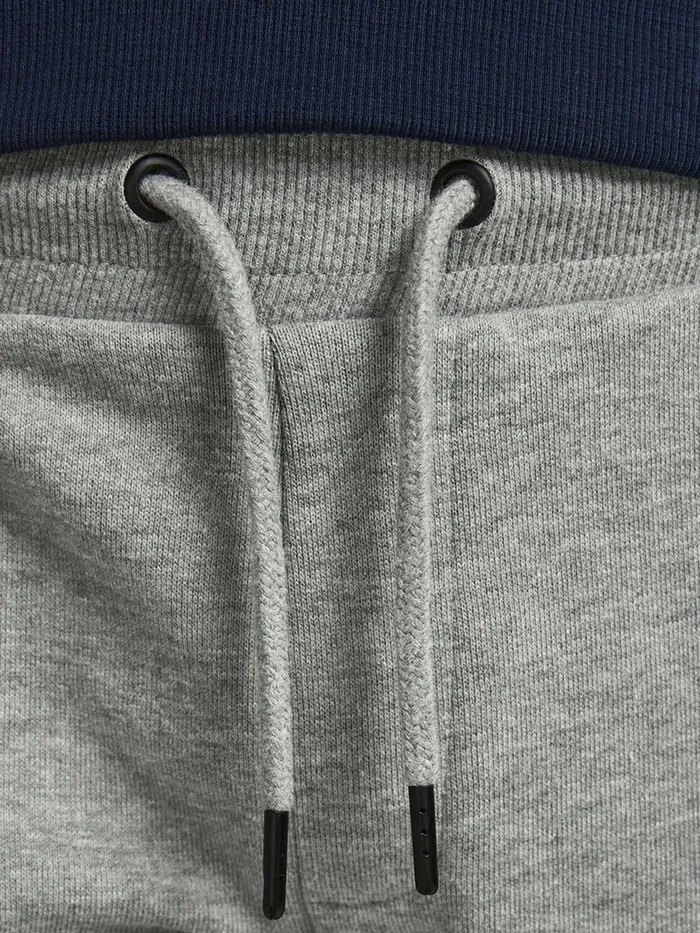 Trousers JACK and JONES Junior BOYS CUFFED SWEATPANTS Grey Light Grey Melange Casaul