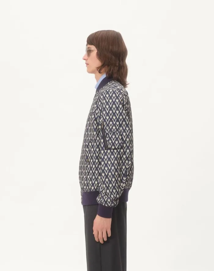 Valentino Outerwear Man Nylon Bomber Jacket With Toute La V Print For Man In Navycream Navycream Valentino Outerwear Man Nylon Bomber Jacket With Toute La V Print For Man In Navycream Navycream