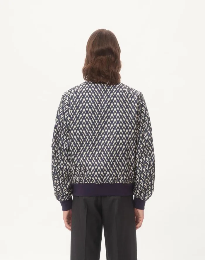 Valentino Outerwear Man Nylon Bomber Jacket With Toute La V Print For Man In Navycream Navycream Valentino Outerwear Man Nylon Bomber Jacket With Toute La V Print For Man In Navycream Navycream