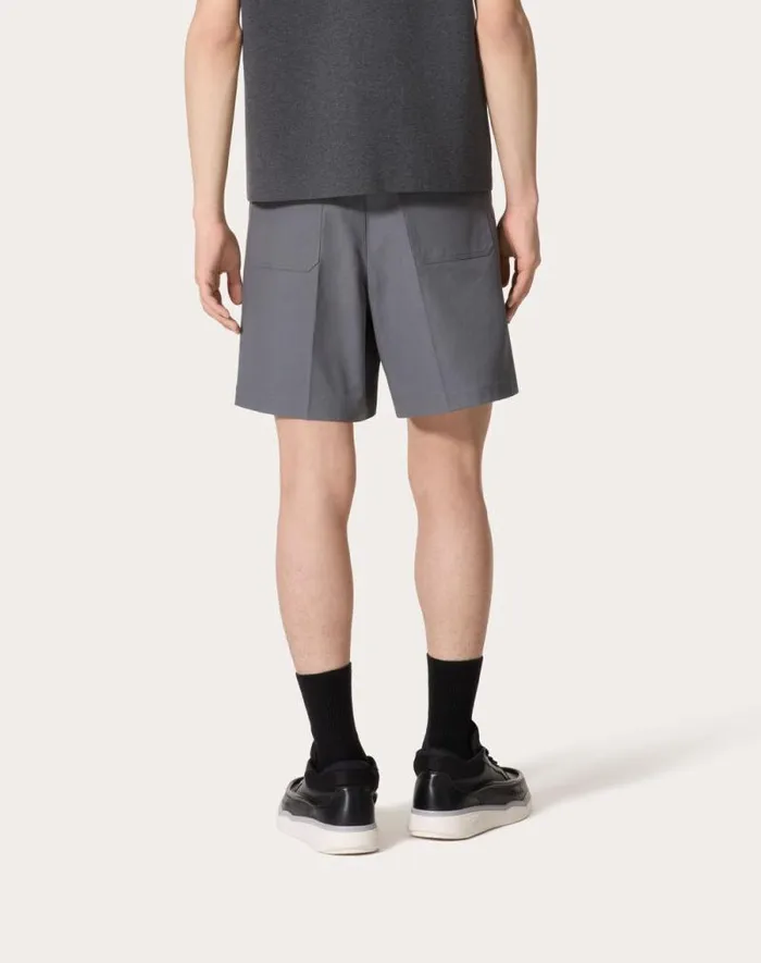 Valentino Pants And Shorts Man Stretch Cotton Canvas Bermuda Shorts With Rubberized V Detail For Man In Light Grey Light Grey Valentino Pants And Shorts Man Stretch Cotton Canvas Bermuda Shorts With Rubberized V Detail For Man In Light Grey Light Grey