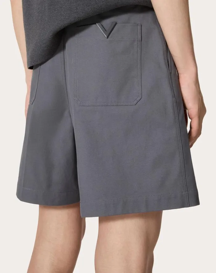 Valentino Pants And Shorts Man Stretch Cotton Canvas Bermuda Shorts With Rubberized V Detail For Man In Light Grey Light Grey Valentino Pants And Shorts Man Stretch Cotton Canvas Bermuda Shorts With Rubberized V Detail For Man In Light Grey Light Grey