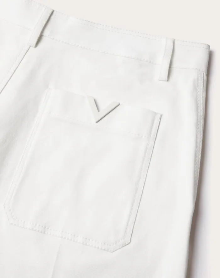 Valentino Pants And Shorts Man Stretch Cotton Canvas Bermuda Shorts With Rubberized V Detail For Man In Light Grey Light Grey Valentino Pants And Shorts Man Stretch Cotton Canvas Bermuda Shorts With Rubberized V Detail For Man In Light Grey Light Grey