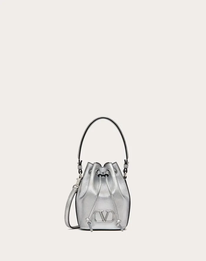 Valentino Shoulder Bags Woman Mini Vlogo Signature Bucket Bag In Metallic Nappa Leather For Woman In Silver Silver Valentino Shoulder Bags Woman Mini Vlogo Signature Bucket Bag In Metallic Nappa Leather For Woman In Silver Silver